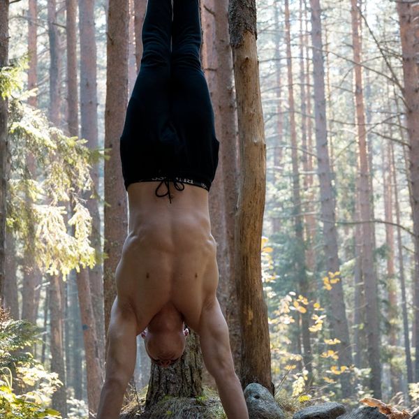 Man stretching outdoors feeling refreshed and full of vitality.